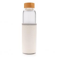 Glass bottle with textured...